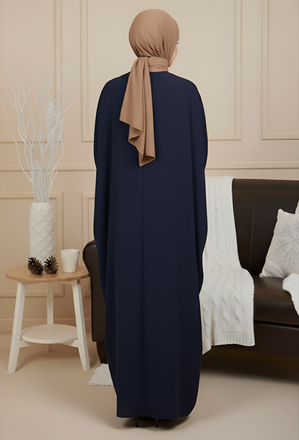 Navy blue abaya with beige hijab, modest Islamic fashion for women, elegant and stylish wear.