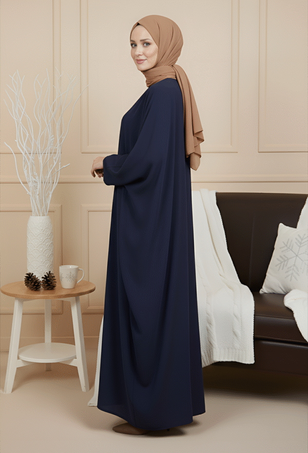 Stylish navy blue modest dress with beige hijab, perfect for special occasions or everyday wear.