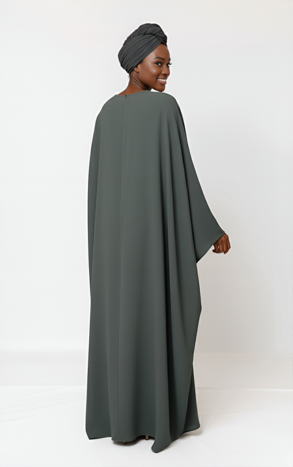 Stylish dark grey abaya with a matching head wrap, perfect for elegant modest fashion.