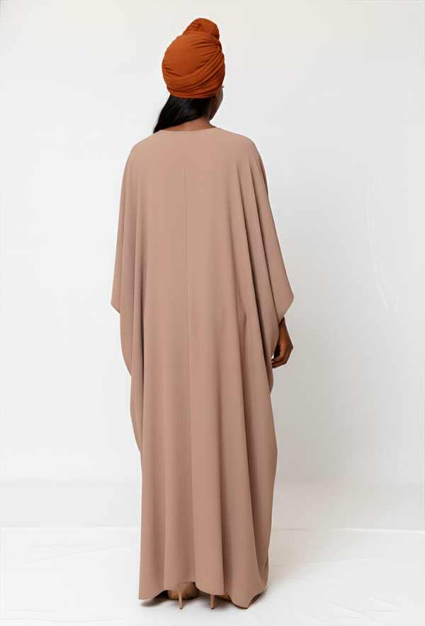 Beautiful beige abaya and burnt orange headscarf, perfect for modest fashion and special occasions.