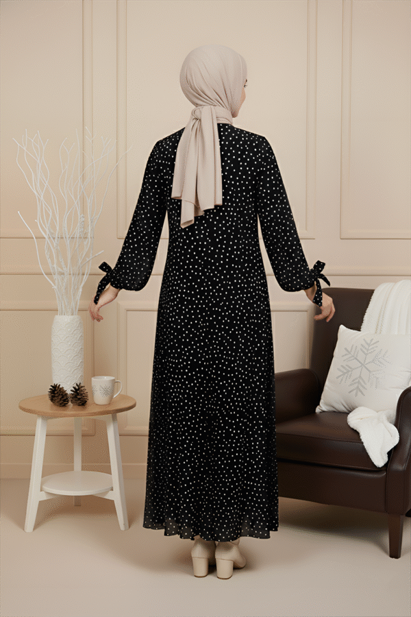 Polka dot maxi dress with modest long sleeves, perfect for elegant occasions and daily wear.