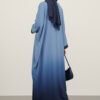 Elegant blue abaya with a navy hijab, perfect for modest fashion and cultural events.