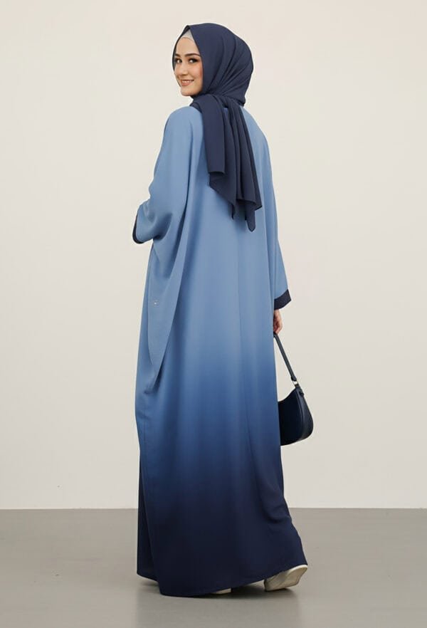Elegant blue abaya with a navy hijab, perfect for modest fashion and cultural events.