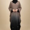 Woman wearing a stylish, embellished abaya with a black hijab, standing confidently.