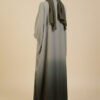 Elegant modest abaya with a matching green hijab, perfect for special occasions and everyday wear.