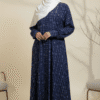 Embroidered navy blue modest dress with white hijab, perfect for cultural and religious occasions.