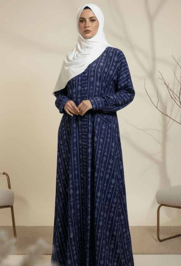Embroidered navy blue modest dress with white hijab, perfect for cultural and religious occasions.