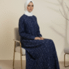 Navy blue embroidered modest dress with white hijab for elegant traditional style.