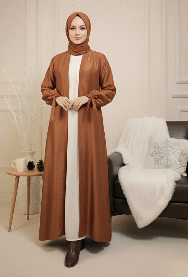 Stylish women's brown abaya and matching hijab, perfect for modest fashion and special occasions.