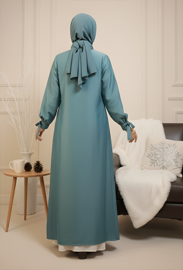 Abaya with matching hijab in soft blue, modest and stylish for special occasions.