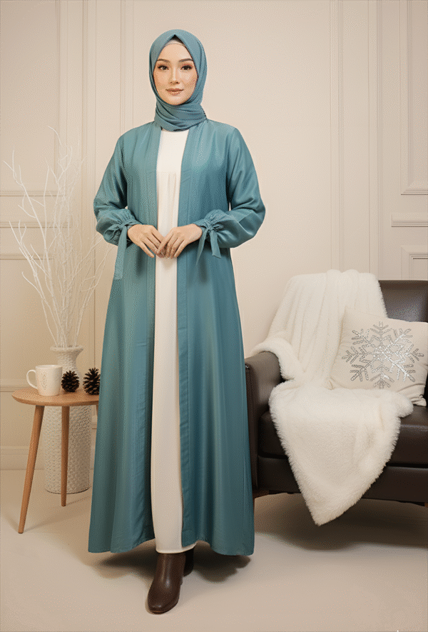 Stylish teal abaya and hijab for women’s fashion.