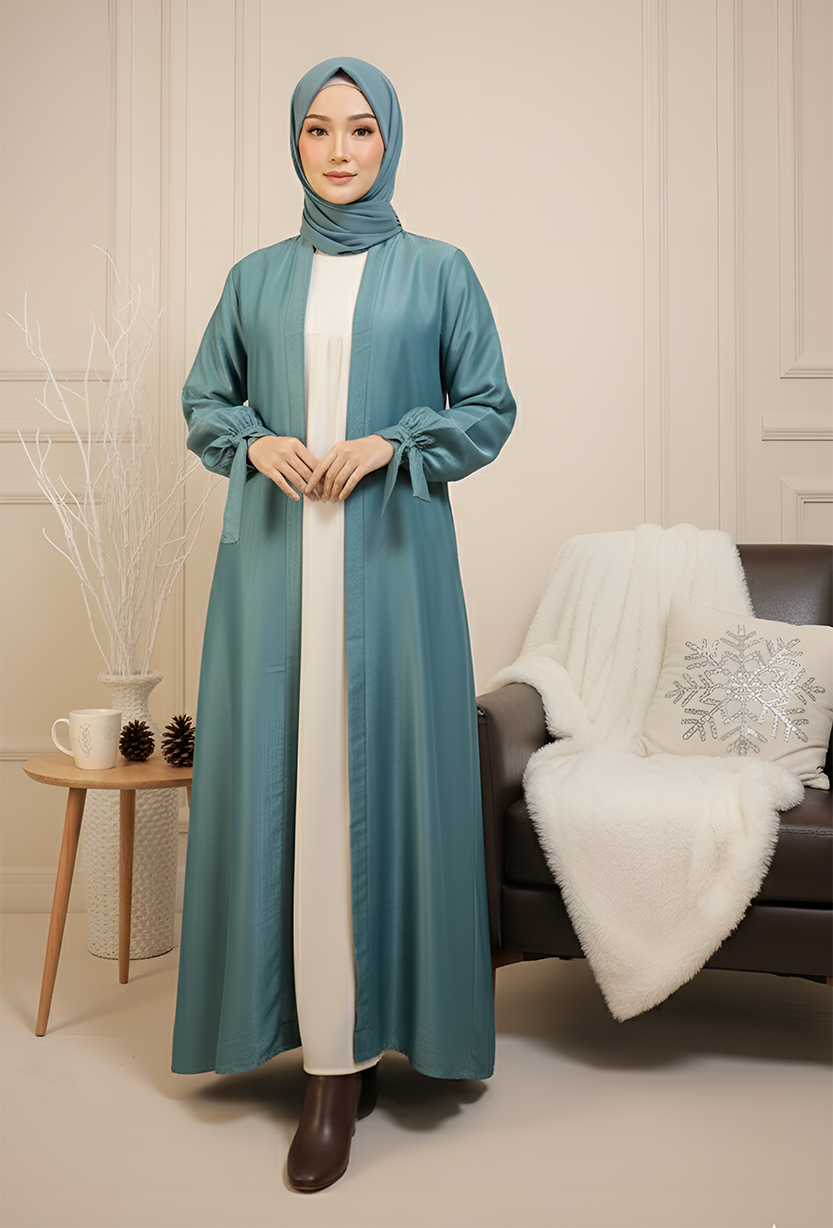 Stylish teal abaya and hijab for women’s fashion.