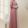 Fashionable women’s pink abaya and hijab, perfect for elegant modest wear and special occasions.