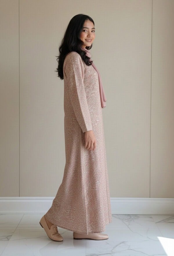 Elegant modest pink dress with long sleeves and matching scarf, perfect for special occasions or cul.