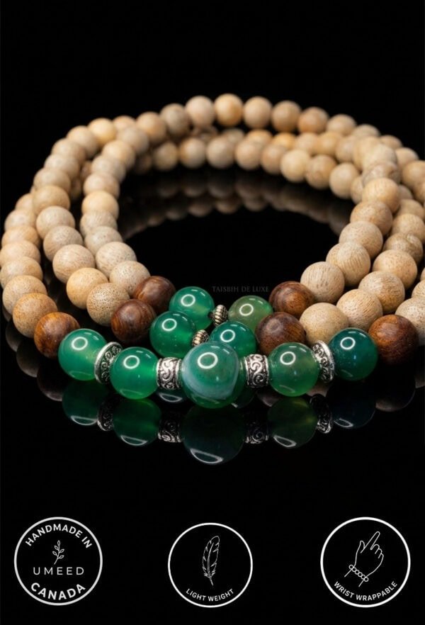 Elegant beaded necklace with natural wood and green gemstone beads.