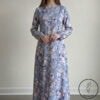 Elegant floral maxi dress in soft blue with pink and white flowers, perfect for casual or special oc.