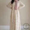 Elegant floral maxi dress with long sleeves and a pink scarf, perfect for casual or special occasion.