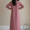 Elegant pink maxi dress with long sleeves, perfect for casual or formal occasions. Handmade and craf.