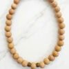 Handmade wooden beaded necklace with adjustable wrap design.