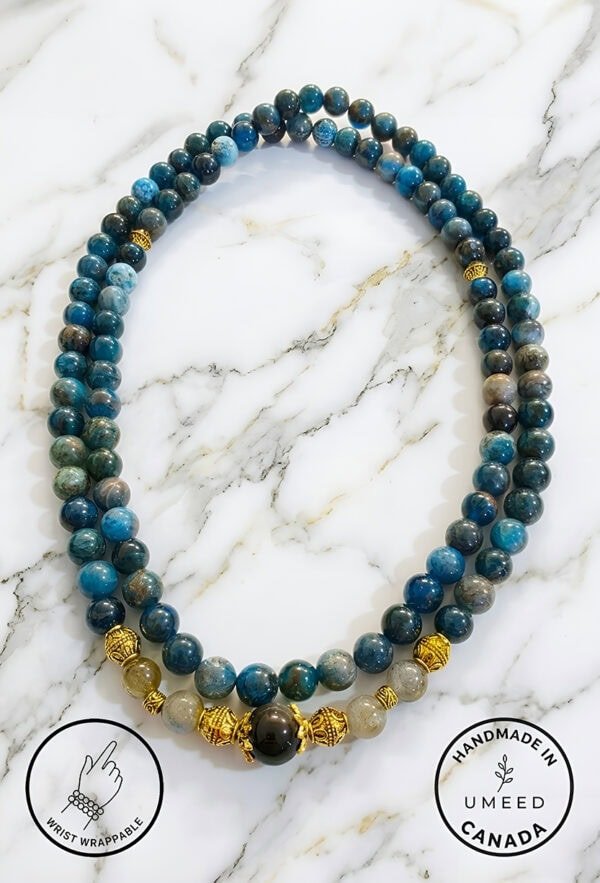 Handmade blue gemstone beaded necklace with gold accents from Umeed Designs.