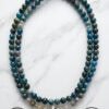 Blue gemstone beaded necklace with silver accents, handmade in Canada.