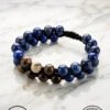 Elegant handmade beaded bracelet with blue, brown, and cream stones, crafted by Umeed Designs in Can.