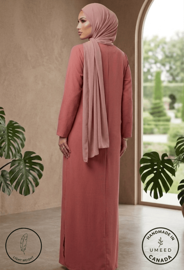 Elegant modest pink abaya with matching hijab, perfect for special occasions and daily wear.