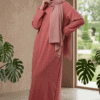 Modest pink dress with matching hijab, perfect for special occasions and everyday wear.