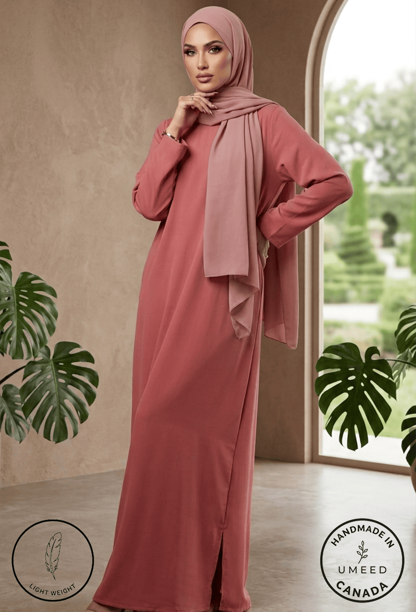 Modest pink dress with matching hijab, perfect for special occasions and everyday wear.