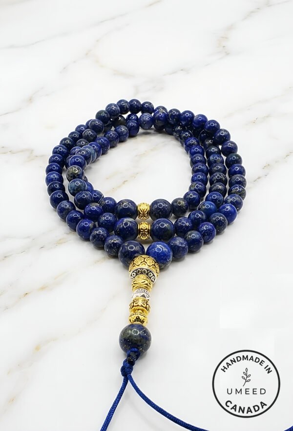 Elegant blue lapis lazuli beaded necklace with gold accents from Umeed Designs.