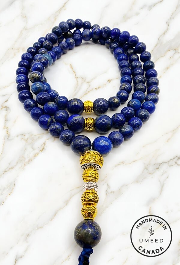 Elegant blue lapis lazuli beaded necklace with gold accents from Umeed Designs.