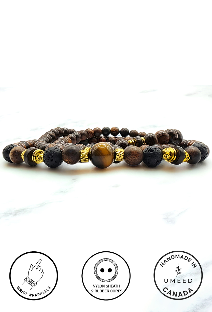 Handmade wooden beaded bracelet with black and brown beads and gold accents.