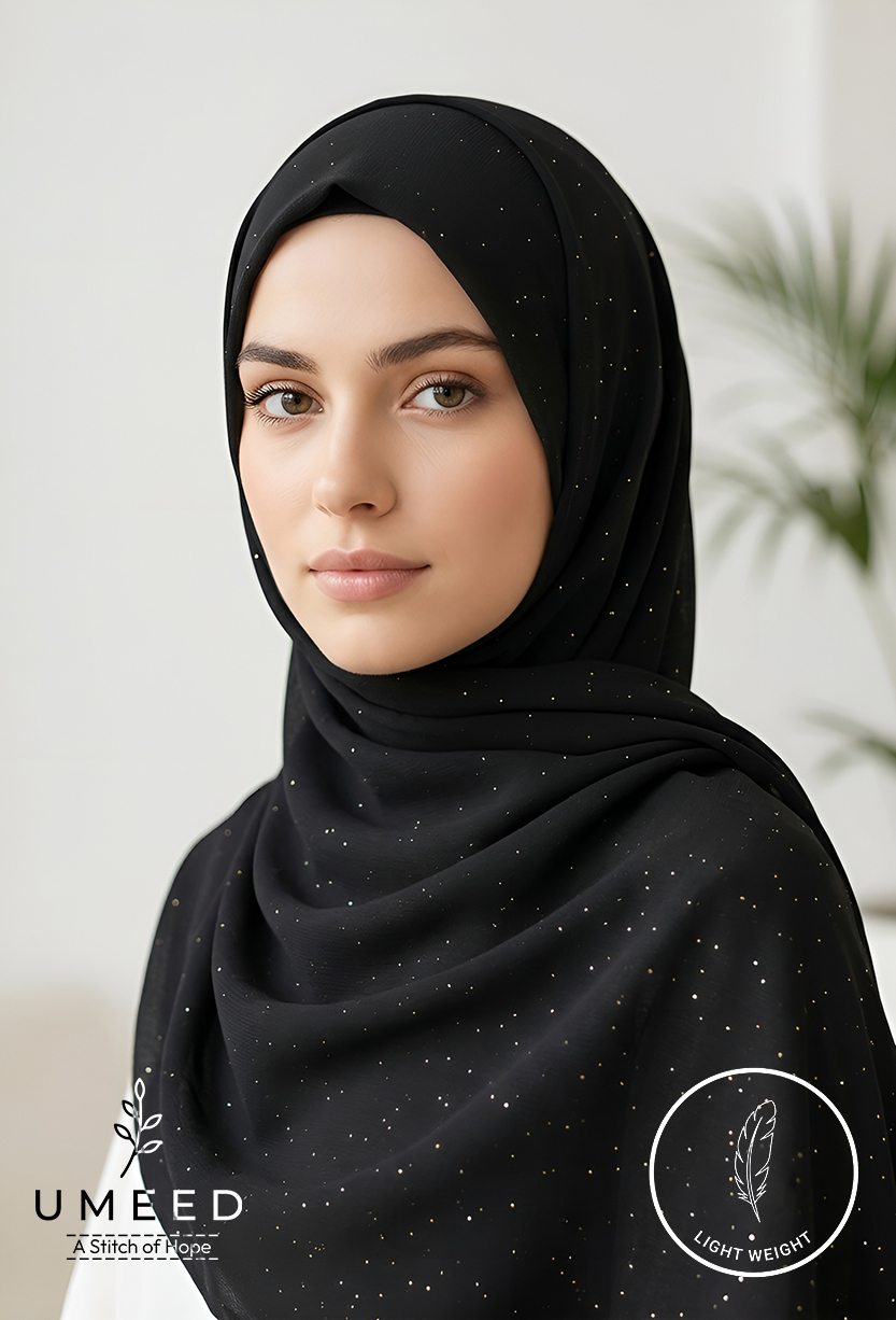Elegant black hijab with subtle gold specks by Umeed Designs.