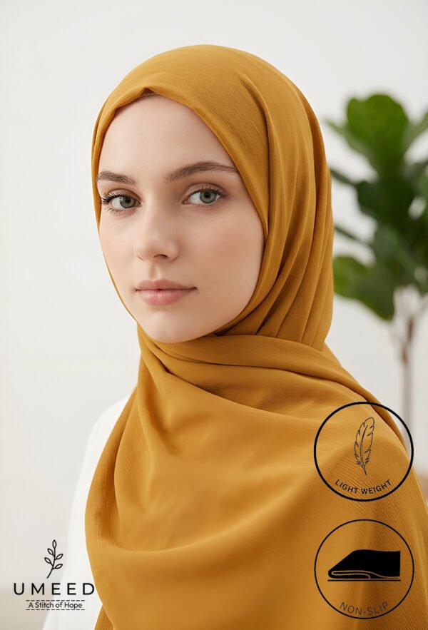 Elegant woman wearing a mustard yellow hijab with a light weight and non-slip design.