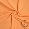 Peach-colored fabric with subtle glitter and light weight label from Umeed Designs.