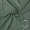Lightweight green fabric with a smooth texture and subtle weave pattern.