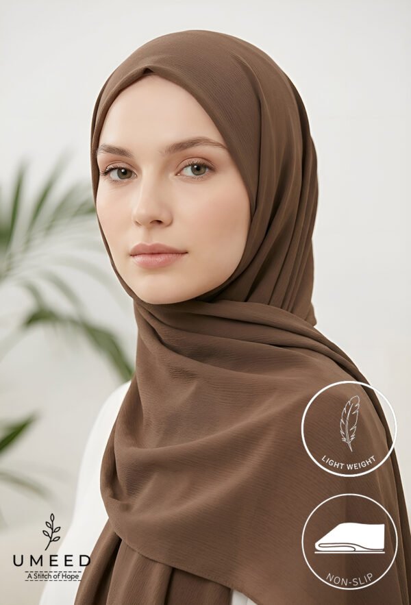 Elegant woman wearing a light weight, non-slip brown hijab from Umeed Designs.