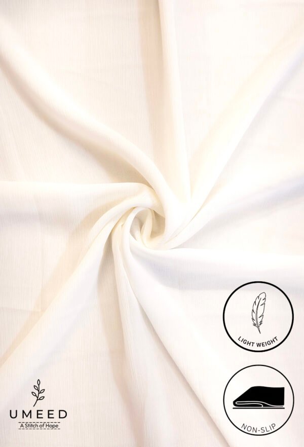 Soft white fabric with a smooth texture, ideal for upholstery and home decor.