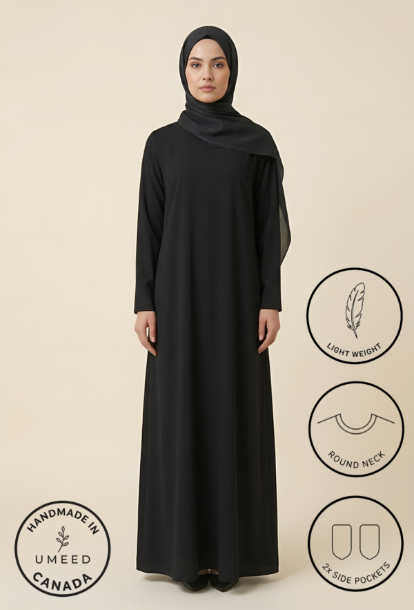 Elegant black abaya with round neck and lightweight fabric for women.