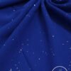 Elegant royal blue fabric with tiny silver glitter accents for special occasions.